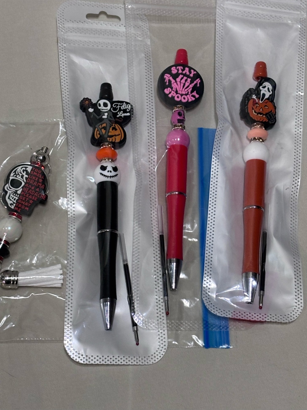 Halloween beaded pens and purse charm ring set of 4 spooky skeleton